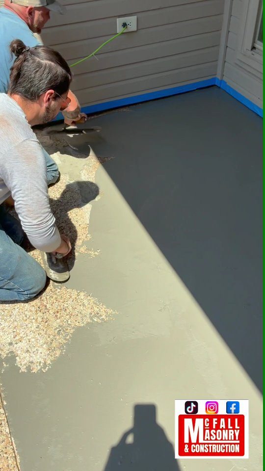 Concrete overlay repair over a cracked slab